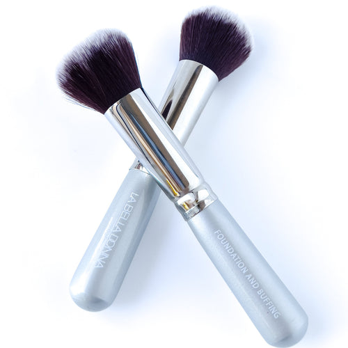 Shown are two broad application brushes